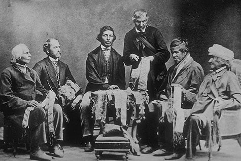 Iroquois Chiefs from the Six Nations Reserve reading Wampum belts in 1871.