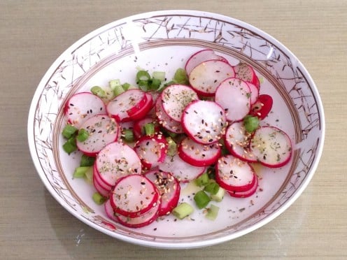 Red radish salad with scallion and roasted sesame seeds