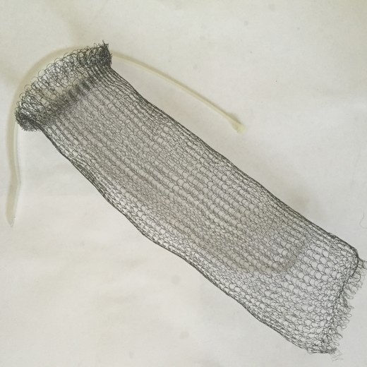 This is an unrolled lint trap that you would use just before attaching to the washing machine discharge hose.