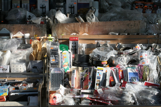 Cooking utensils being sold at a market.