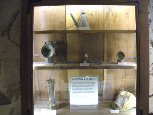 A display of antique miners' lamps