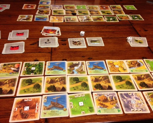 A game of Rivals of Catan further along in the process.