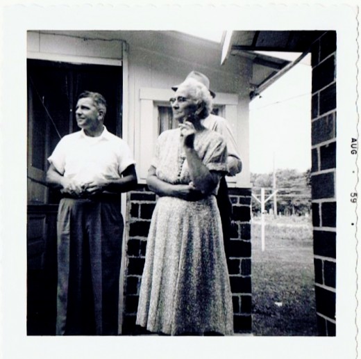 With his mother and father