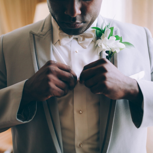 The handsome groom prepares for his day. Photo by Chelsea Olivieri