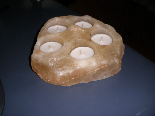 Tea light candles, the old power outage standby.  Used safely, they can provide a nice amount of light.