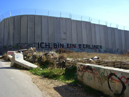 Graffiti on the Gaza wall quotes the famous words of John F. Kennedy in 1963 - "Ich bin ein Berliner" (English: "I am a Berliner") Graffiti on the Gaza wall quotes the famous words of John F. Kennedy in 1963 - "Ich bin ein Berliner" (English: "I am a Berliner")