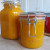 Pumpkin puree in a Fido jar, rear, and a Le Parfait jar, front