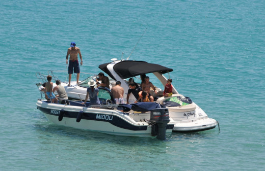 Friends and family enjoy time aboard a boat - however, I don't recommend living aboard one like this!