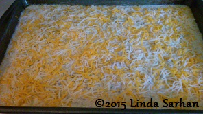 Poured evenly and cheese sprinkled across the top. It's ready for baking!