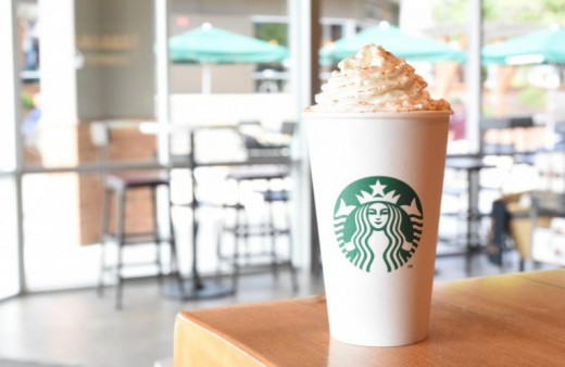 Enjoy a pumpkin spice latte at Starbucks.