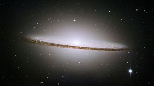 Depicted: The Sombrero Galaxy. Unfortunely, scientists have yet to find its cosmic mariachi owner.