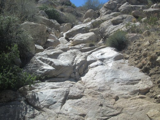 Granite rocks have become smooth with many years of water flowing down the canyon. 
