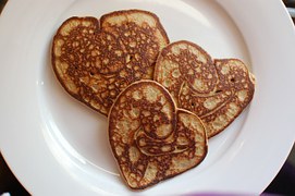 Crisp pancakes cooked to resemble a heart