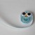 Wrap a blue quilling paper around the coils. Wrap a blue quilling paper around the coils.