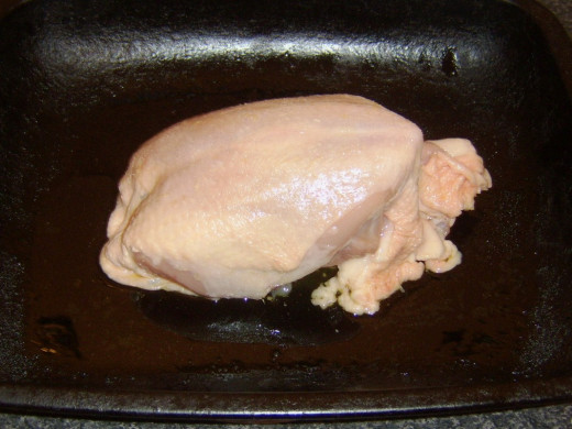 Chicken crown and body is roasted on a deep tray