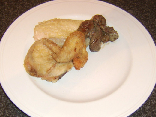 Chicken components of meal are plated