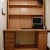 An impressive fit of a great oak writing desk in a small room. An impressive fit of a great oak writing desk in a small room.