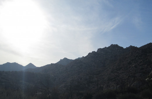 A myriad of boulders are visible on the sun drenched peaks of the Pinnacles.
