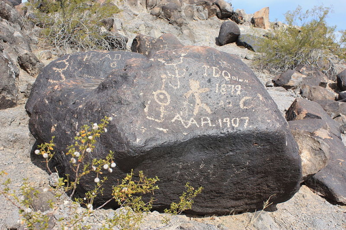 Native American petroglyphs coupled with modern inscriptions, Painted Rock National Monument, Arizona