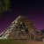 Sculpture/carving of Indigenous pyramid in the park.