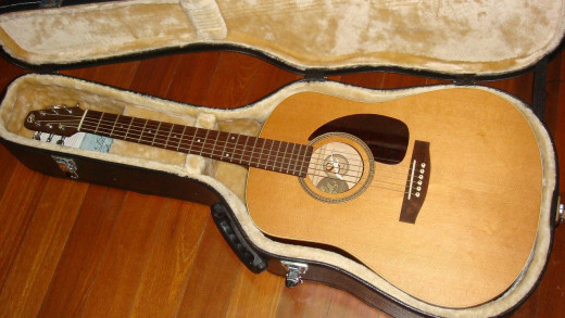 Weight and sound of an acoustic guitar
