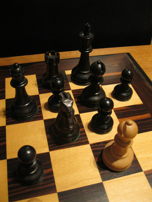 Simple tactic - a Knight pinned to the Queen