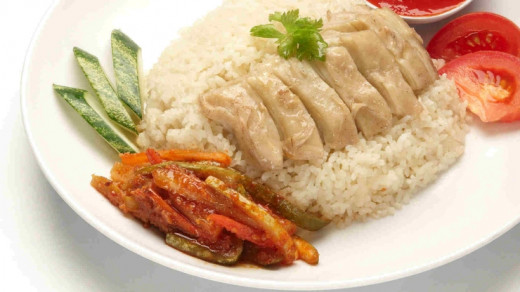 Chicken rice with side dish of prickles (a.k.a achar)