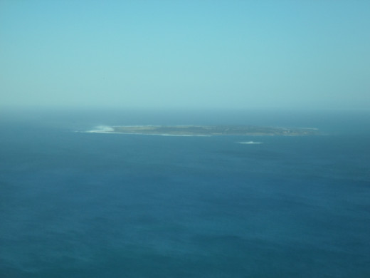 Robben Island can be visited but the view from Signal Hill is nice to see.