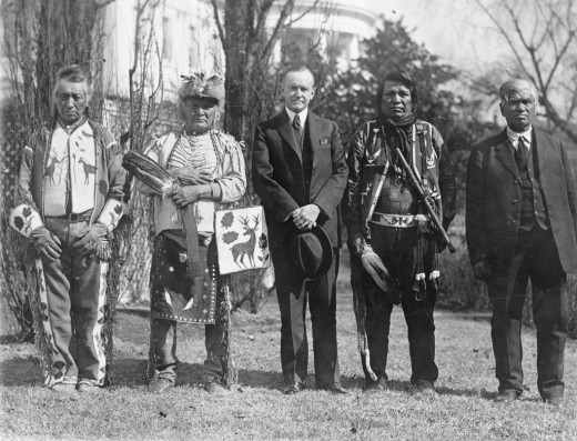 Osage men with American President Calvin Coolidge after signing the Indian Citizenship Act of 1924. 