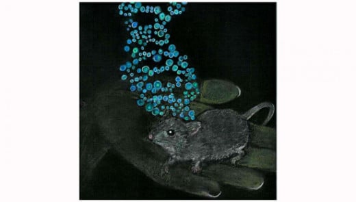 A mouse held in a woman's hand with bubbles forming a DNA chain floating above it