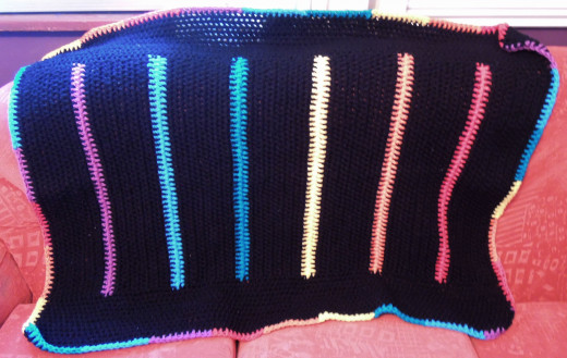 Finished Chunky Rainbow Crochet Blanket (free crochet tutorial).