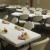Tables set for 60 guests, plates waiting on steaming bowls of taco chili. Tables set for 60 guests, plates waiting on steaming bowls of taco chili.