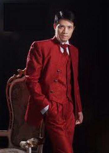 This red groom suit has a very festive look.