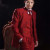 This red groom suit has a very festive look.