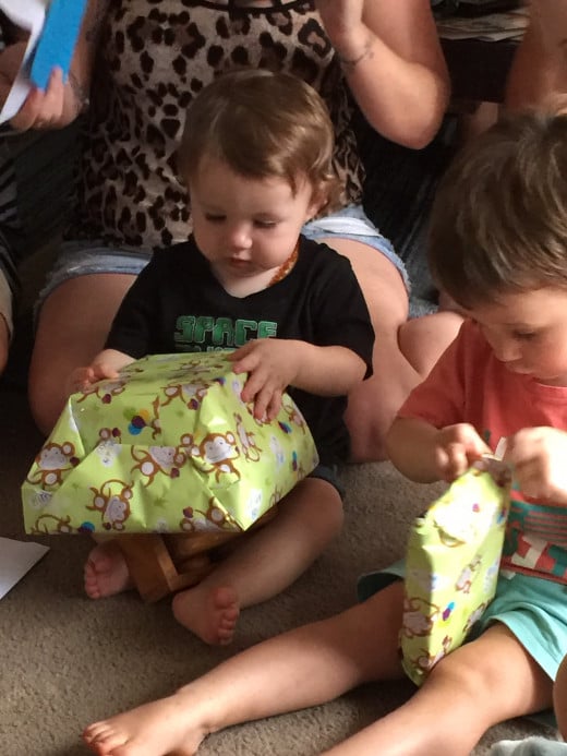 Grandsons Dylan and Jordan opening presents