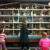 Kids at play with a dollhouse Kids at play with a dollhouse