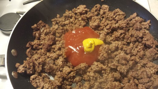 Add tablespoon of mustard and Tabasco sauce