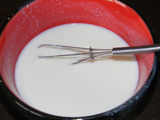 Use a whisk or fork to blend your facial lotion
