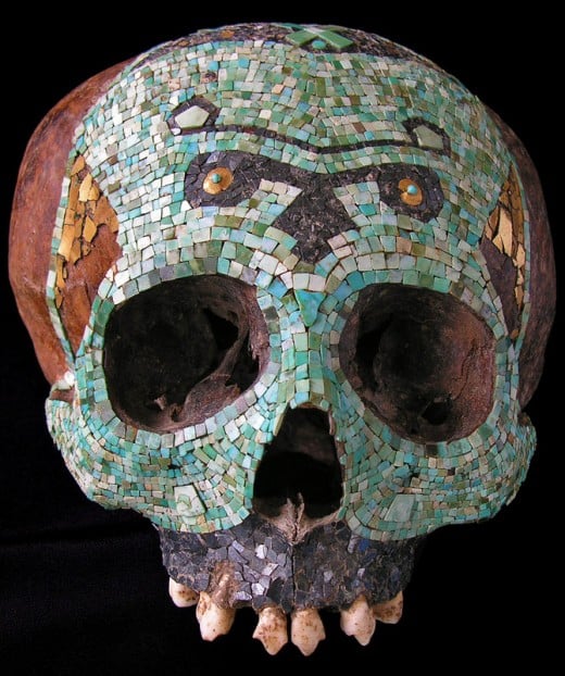 By Dr. Marc Ghysels (used here by permission) This Aztec skull from a private collection, decorated with turquoise, hematite, and tumbaga mosaic-work, features an animal motif on the forehead. 