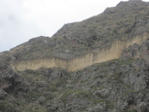 Walls on all the surrounding cliff sides.
