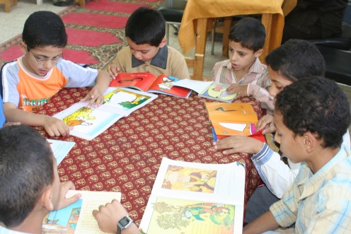 Children in a school in Egypt reading story books-Image of children reading