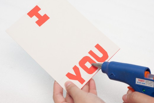 That's you gluing the white rectangle onto the middle of the letter O if you choose to do that.