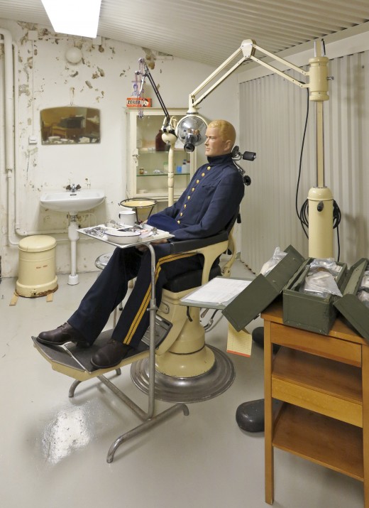 Dental clinics look scary. a manikin on a dental chair