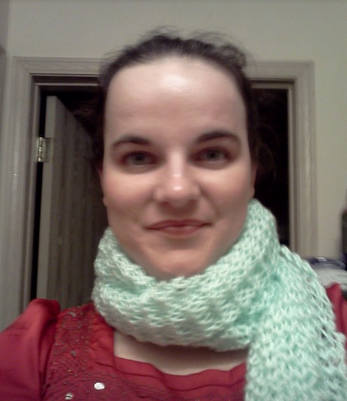 You can make a personalized gift like this garter stitch scarf following the free knitting pattern in this article!