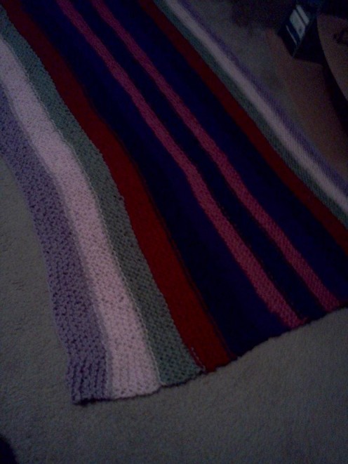 This was my first big garter stitch project - an afghan! As I made it, I decided to make it multi-color to make it more interesting! My friend still loves and uses it years later!