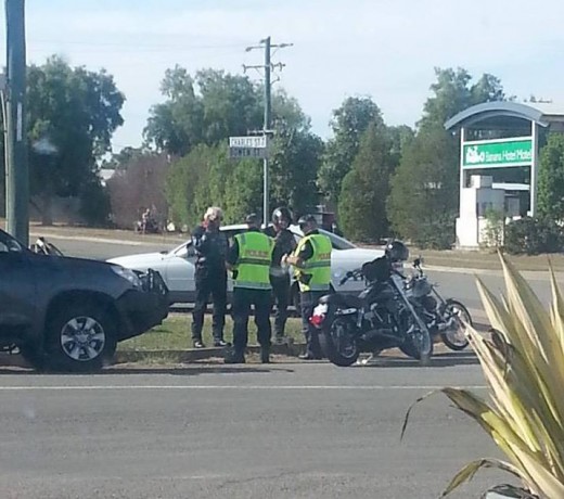 Photo of police intercepting members riding two by two as the VLAD law requires in Banana, QLD. Behind the front two riders intercepted was another police vehicle that had detained another two riders on the roadside. 