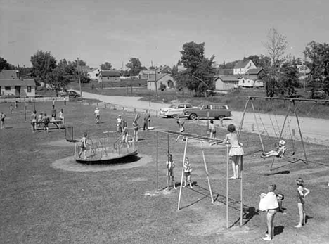I once lived in the little white house you see just above the swing set.  In-Laws house was at the top of the hill on the street going past.  If not the white one, just past it behind the trees.