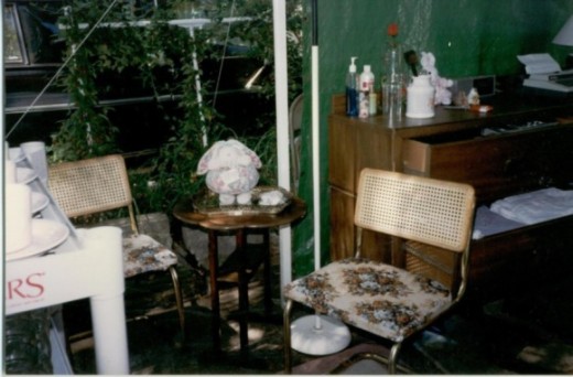 The only thing I still have is that little bunny on top of the drawer unit.  Here you see a couple of kitchen chairs I reupholstered and sold, as well as a little drop leaf table.