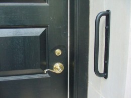 A simple addition of a grab bar combined with an easy-to-open lever handle can make entering your house uncomplicated and safe.