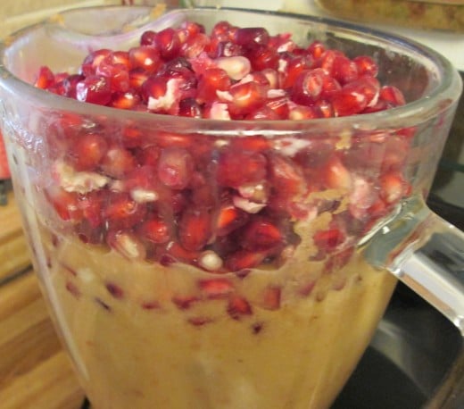 I decided to add the pomegranate seeds last to this brimming over the top smoothie. I like to make big batches of smoothies so these will last me a day or two.